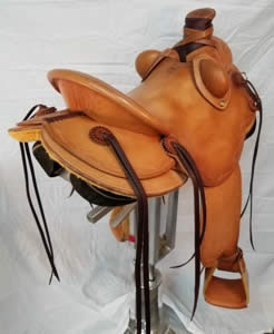 3B saddle, buck rolls, rope strap